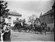 A horse-drawn coach driving past a group of cottages, Greater London Authority, 1895-1905. Creator: Charles William Prickett