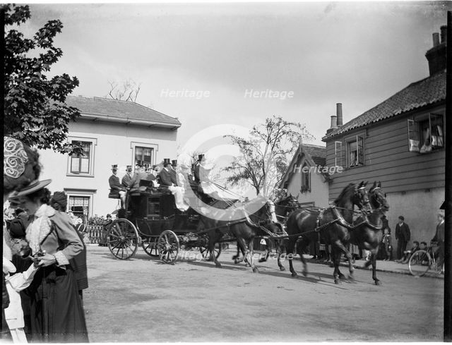 A horse-drawn coach driving past a group of cottages, Greater London Authority, 1895-1905. Creator: Charles William  Prickett.