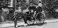 A horse-drawn hansom cab, London, 1926-1927