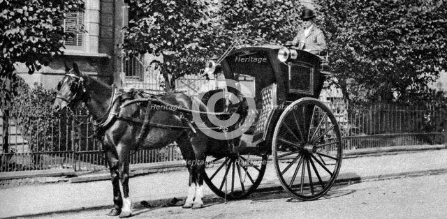 A horse-drawn hansom cab, London, 1926-1927. Artist: Unknown