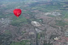 A hot air balloon in flight over York, 2023. Creator: Robyn Andrews