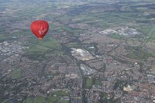 A hot air balloon in flight over York, 2023. Creator: Robyn Andrews