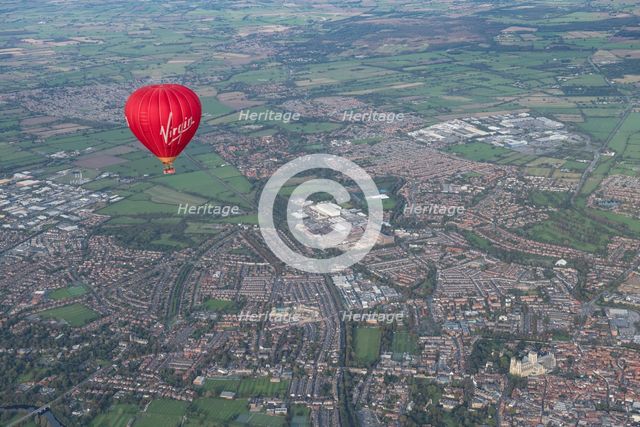 A hot air balloon in flight over York, 2023. Creator: Robyn Andrews.