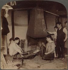 A Japanese blacksmith at his forge, Yokohama, Japan 1904