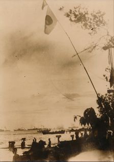 A Japanese convoy disembark troops on a Pacific island, c.1943. Creator: Unknown