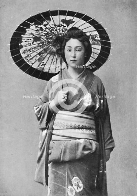 A Japanese lady in walking costume, 1902. Artist: Unknown.