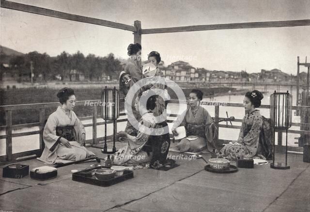 'A Japanese Meal', c1903. Artist: David Stevenson & Co.