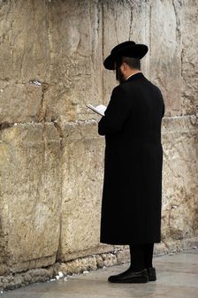 A Jew praying at the Western Wall, Jerusalem, Israel, 2013. Creator: LTL