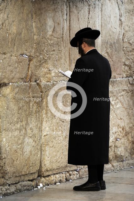 A Jew praying at the Western Wall, Jerusalem, Israel, 2013.  Creator: LTL.