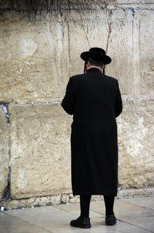 A Jew praying at the Western Wall, Jerusalem, Israel, 2013. Creator: LTL
