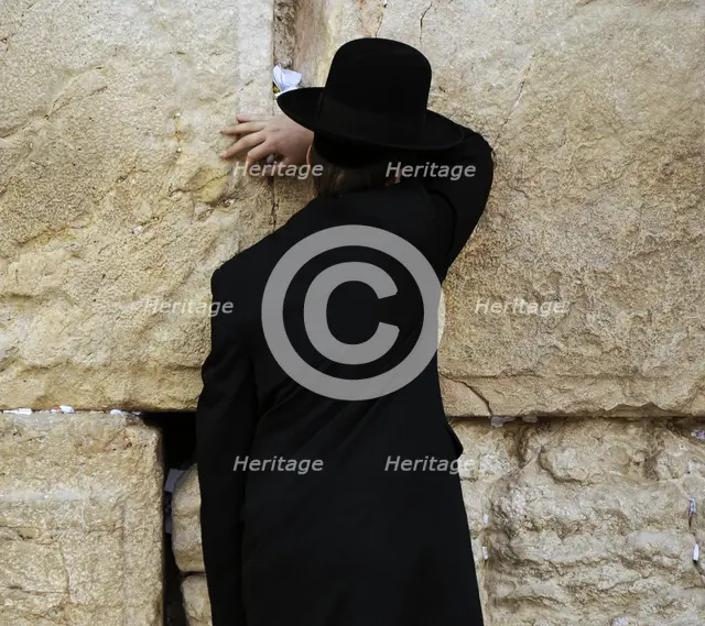A Jew praying at the Western Wall, Jerusalem, Israel, 2013.  Creator: LTL.