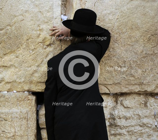 A Jew praying at the Western Wall, Jerusalem, Israel, 2013.  Creator: LTL.