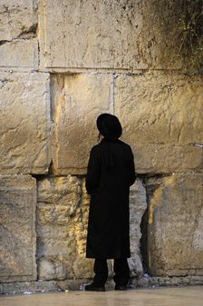 A Jew praying at the Western Wall, Jerusalem, Israel, 2013. Creator: LTL