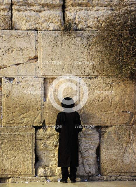 A Jew praying at the Western Wall, Jerusalem, Israel, 2013.  Creator: LTL.