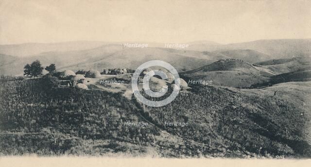 'A Kafir Kraal - Zululand', early 20th century. Creator: Unknown.