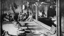 A Kalimantan native long house, Borneo, 1922