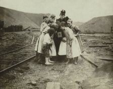 A Kodak creates a sensation, between 1890 and 1900. Creator: Unknown