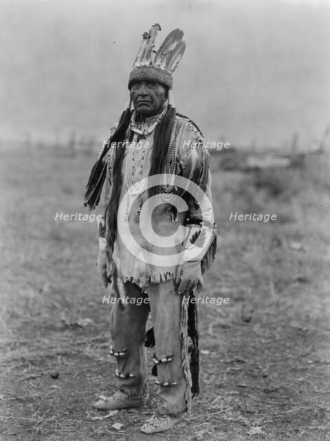 A Klamath in costume, c1923. Creator: Edward Sheriff Curtis.