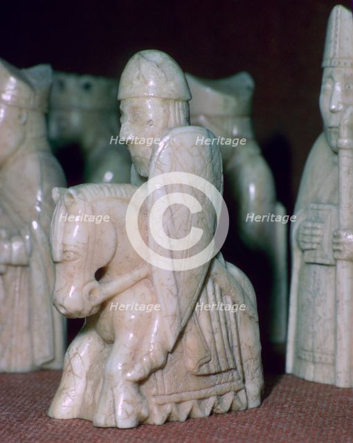 A Knight - The Lewis Chessmen, (Norwegian?), c1150-c1200. Artist: Unknown