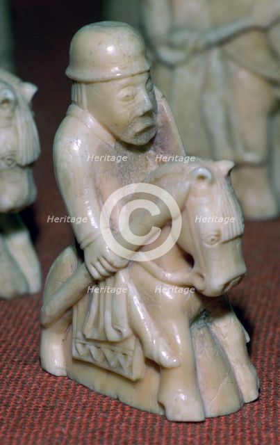 A Knight - The Lewis Chessmen, (Norwegian?), c1150-c1200. Artist: Unknown