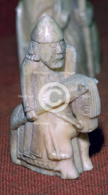 A Knight - The Lewis Chessmen, (Norwegian?), c1150-c1200. Artist: Unknown