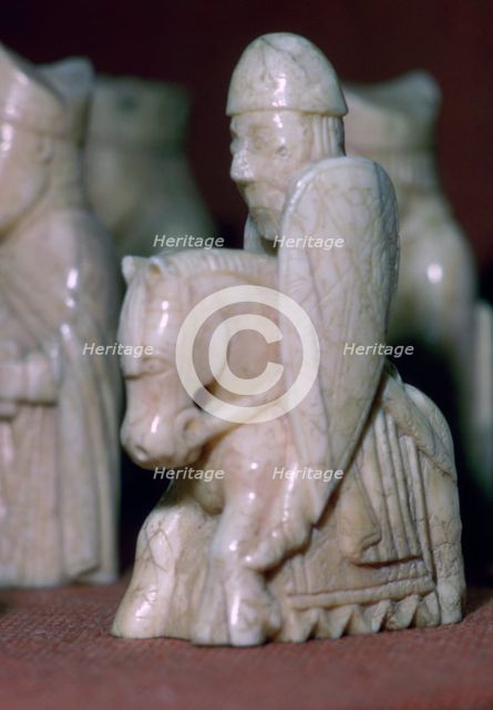 A Knight - The Lewis Chessmen, (Norwegian?), c1150-c1200. Artist: Unknown