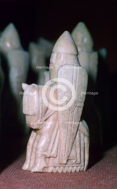 A Knight - The Lewis Chessmen, (Norwegian?), c1150-c1200. Artist: Unknown