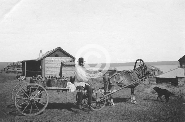 A kumys delivery man at the resort of Lake Shira, 1900-1909. Creator: LI Vonago.