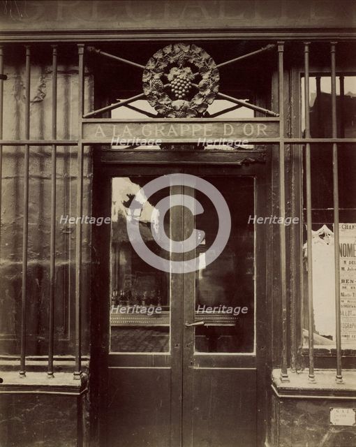 A la Grappe d'Or, 4 place d'Aligre, 1911. Creator: Eugene Atget.