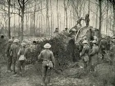 A Landship Bringing in Under Camouflage a 5.9 German Naval Gun (1919). Creator: Unknown