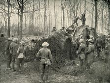 A Landship Bringing in Under Camouflage a 5.9 German Naval Gun (1919). Creator: Unknown