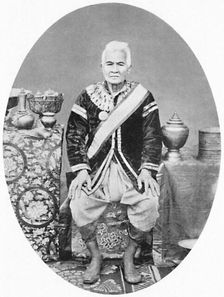 A Lao chief, 77 years old, In Siamese uniform, 1902. Artist: James McCarthy