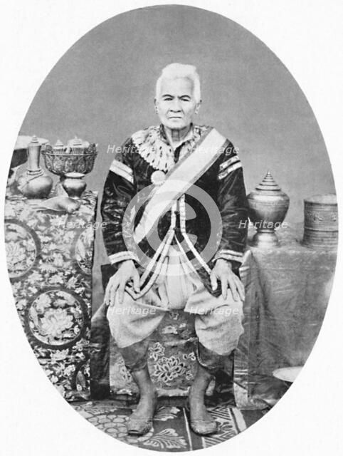 A Lao chief, 77 years old, In Siamese uniform, 1902. Artist: James McCarthy.
