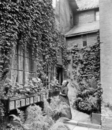 A lady gardener, c1860-c1922. Artist: Henry Taunt