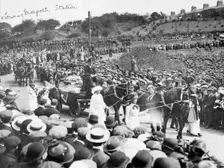 A large crowd watches Emily Wilding Davison's funeral procession 15th June 1913. Creator: Unknown