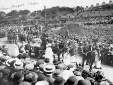A large crowd watches Emily Wilding Davison's funeral procession 15th June 1913. Creator: Unknown