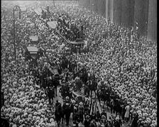 A Large Crowd Watching a Ticker Tape Parade in New York City, 1926. Creator: British Pathe Ltd