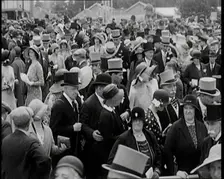 A Large Crowd of Smartly Dressed People in Hats at Ascot Horse Racing Track, 1931. Creator: British Pathe Ltd