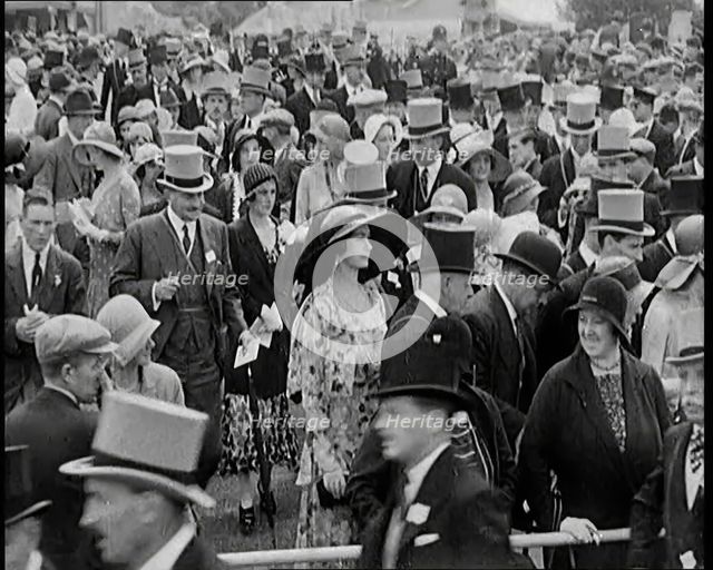 A Large Crowd of Smartly Dressed People in Hats at Ascot Horse Racing Track, 1931. Creator: British Pathe Ltd.
