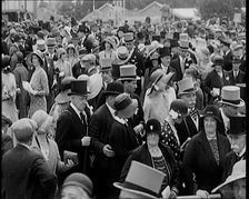 A Large Crowd of Smartly Dressed People in Hats at Ascot Horse Racing Track, 1931. Creator: British Pathe Ltd