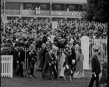 A Large Crowd of Smartly Dressed People in Hats at Ascot Horse Racing Track, 1931. Creator: British Pathe Ltd