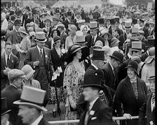 A Large Crowd of Smartly Dressed People in Hats at Ascot Horse Racing Track, 1931. Creator: British Pathe Ltd