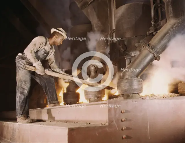 A large electric phosphate smelting furnace used to make...vicinity of Muscle Shoals, Ala., 1942. Creator: Alfred T Palmer.