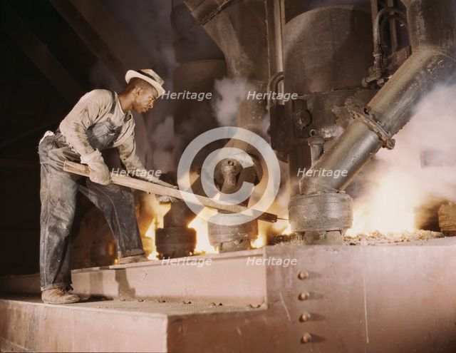 A large electric phosphate smelting furnace used to make...vicinity of Muscle Shoals, Ala., 1942. Creator: Alfred T Palmer.