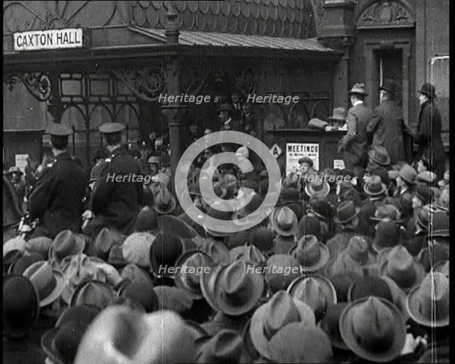 A Large Group of Civilians and Two Uniformed Males on Horse Back Outside Caxton Hall, 1924. Creator: British Pathe Ltd.