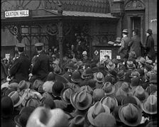 A Large Group of Civilians and Two Uniformed Males on Horse Back Outside Caxton Hall, 1924. Creator: British Pathe Ltd