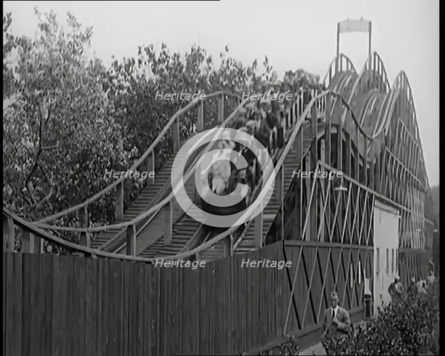 A Large Group of Female Civilians Enjoying  a Roller Coaster Ride, 1926. Creator: British Pathe Ltd.
