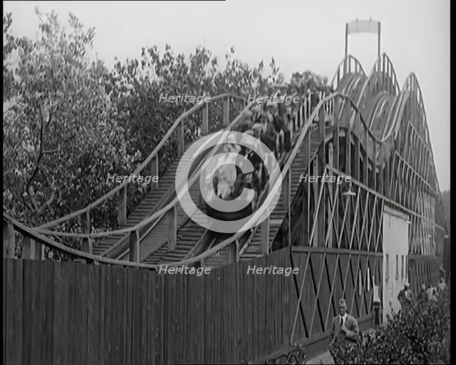 A Large Group of Female Civilians Enjoying  a Roller Coaster Ride, 1926. Creator: British Pathe Ltd.