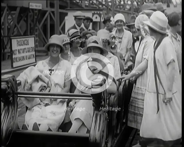 A Large Group of Female Civilians Enjoying  a Roller Coaster Ride, 1926. Creator: British Pathe Ltd.
