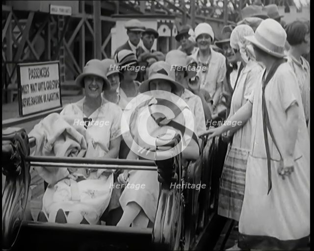 A Large Group of Female Civilians Enjoying  a Roller Coaster Ride, 1926. Creator: British Pathe Ltd.